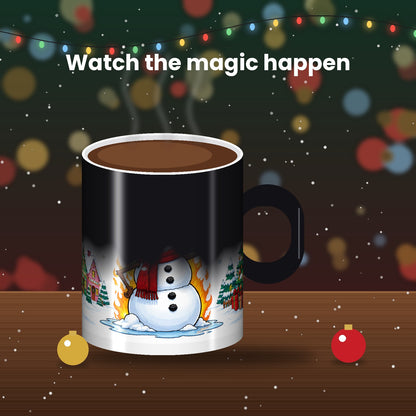 Magic mug turning from black to white revealing Christmas design